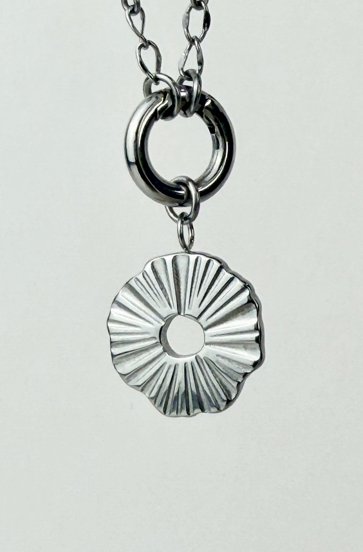 Circle Sunburst Charm